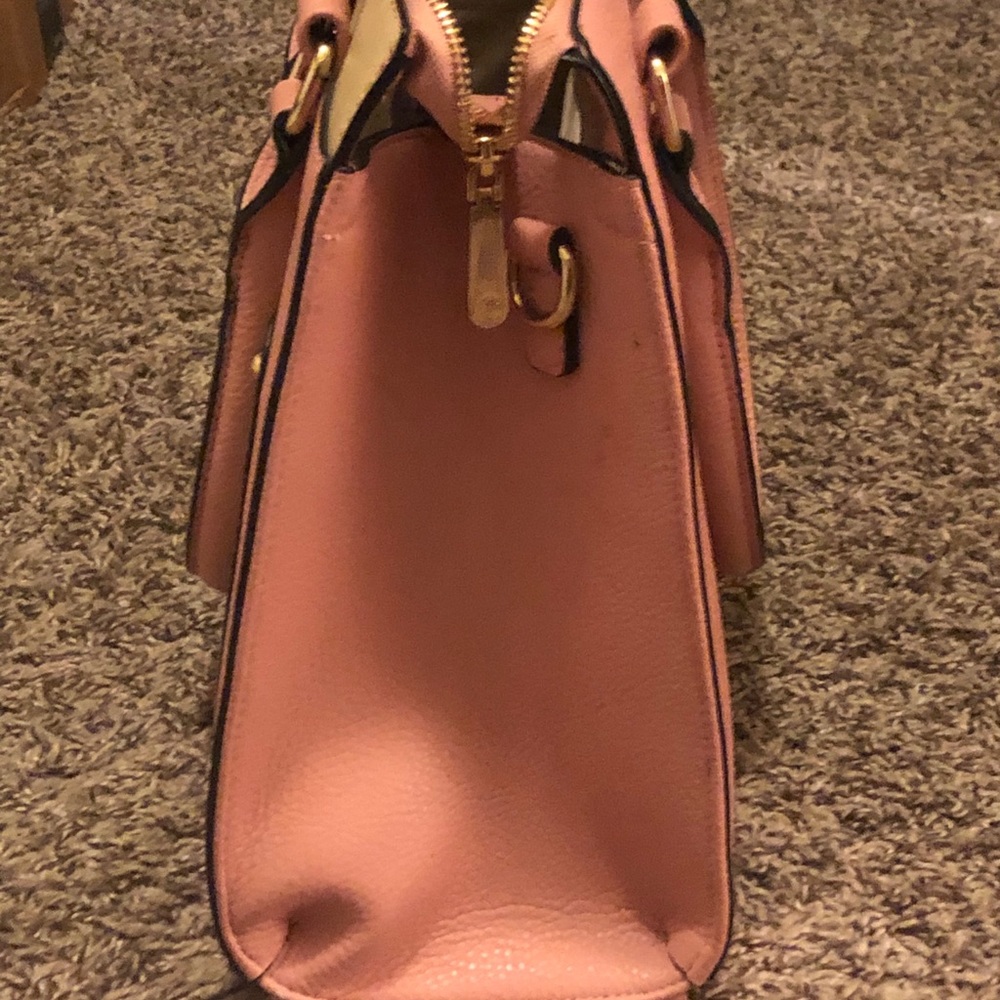 Pink and tan handbag